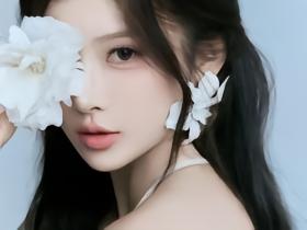 田径花仙子，吴艳妮拍摄森系写真，长发露背可爱娇俏